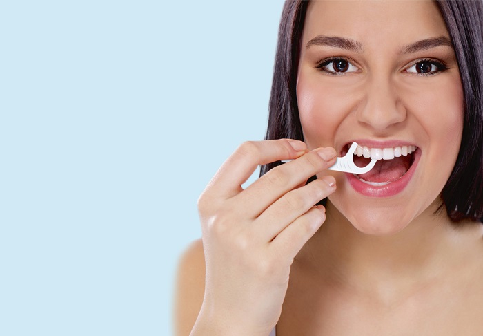 Vårda dina tänder med tandtråd